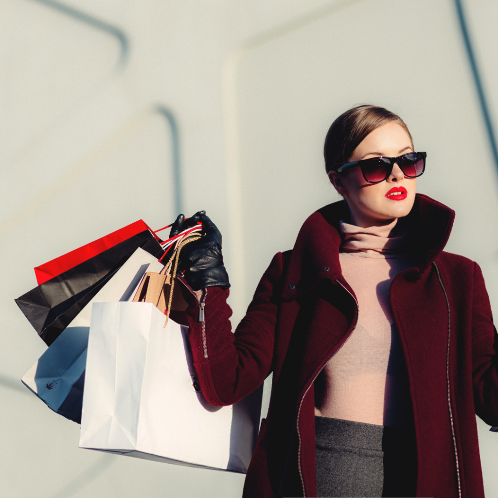 photo of woman with shopping bags